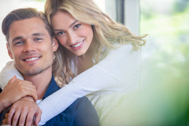 istock Couple relaxing on the sofa 1162302396