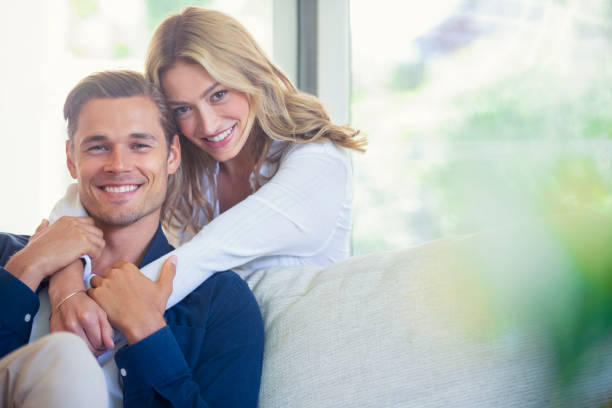 istock Couple relaxing on the sofa. 1162302399