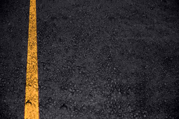 istock road asphalt texture with traffic line for transport background with space for text 1162303960