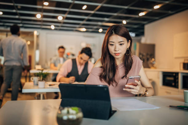 istock Beautiful lady in modern office 1162304926