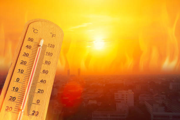 global warming high temperature city heat wave in summer season concept. stock photo