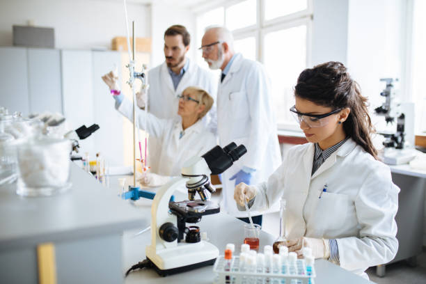 istock Scientists conducting science experiment in research laboratory 1162306246