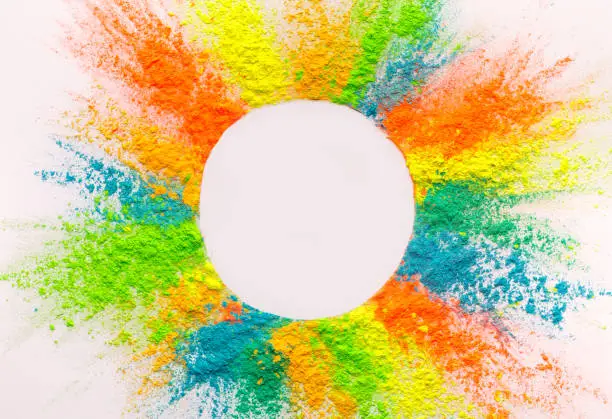 Photo of Circle blank space inside multicolored holi paints