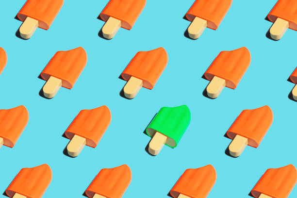 istock Colorful ice cream popsicle pattern on bright blue background. 1162308798