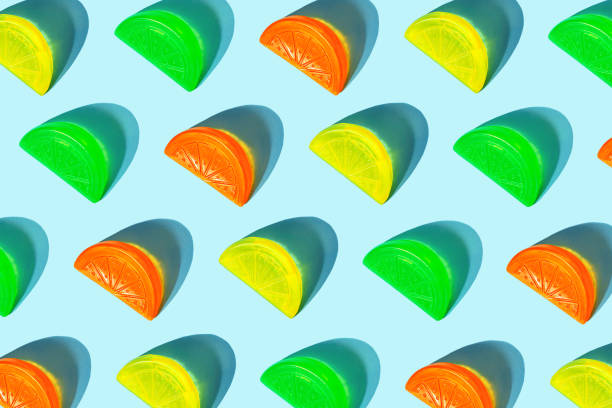 istock Colorful ice cream popsicle pattern on bright orange background. 1162308807