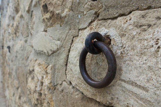 istock Iron retaining ring on an old city wall of Rust in Austria 1162309424