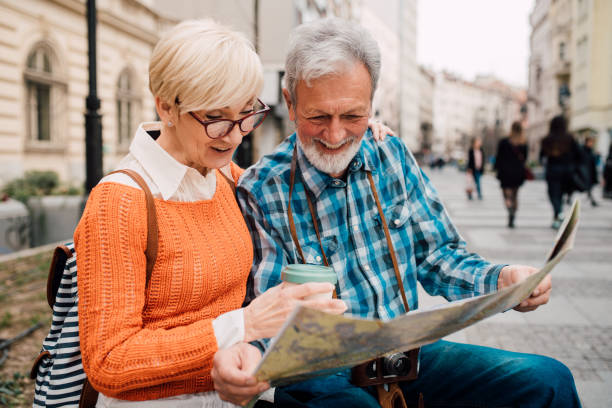 istock Senior couple looking at the map 1162317689