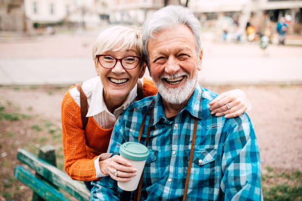 istock Elderly couple hugging and smiling 1162318077