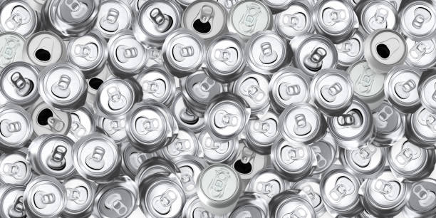 istock Recycling concept. Used soda cans stacked as background. 1162318943
