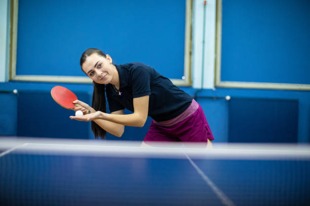 istock Young female table tennis player in action 1162320553
