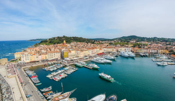 panorama of saint tropez, cote d'azur, france, south europe. nice city and luxury resort of french riviera. famous tourist destination with nice beach on mediterranean sea - capital letter luxury blue image imagens e fotografias de stock