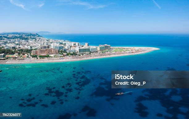 Aerial Birds Eye View Drone Photo Of Elli Beach On Rhodes City Island Dodecanese Greece Panorama With Nice Sand Lagoon And Clear Blue Water Famous Tourist Destination In South Europe Stock Photo - Download Image Now