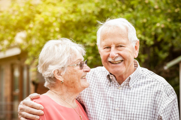 Big Love Lovley sweet old couple laughing stand side by side northern european stock pictures, royalty-free photos & images