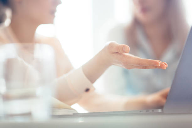 istock Hands of a girl working on a laptop 1162330433