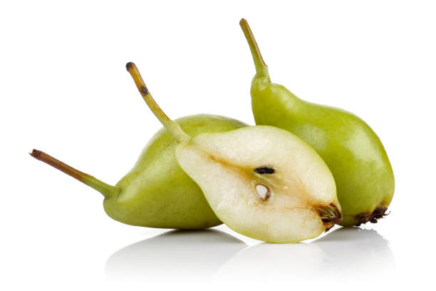 istock Fresh pear fruits isolated on white 1162332537