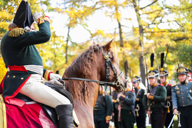 Saint Petersburg, Russia - October 13, 2018: Historical reconstruction. General on horse. Solemn march of guard and cavalry of Russian army in costumes of XIX century. Soldiers, infantry regiments in.