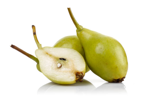 istock Fresh pear fruits isolated on white 1162333452
