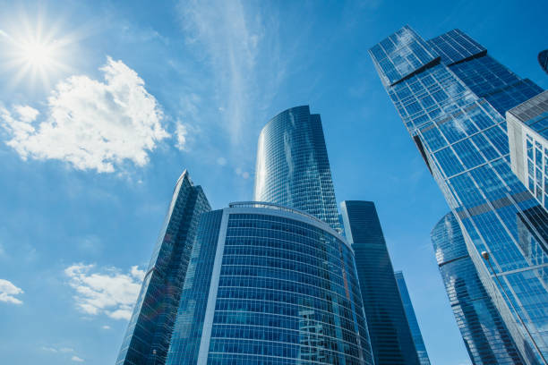 istock Modern office buildings under blue sky. Business background. 1162334424
