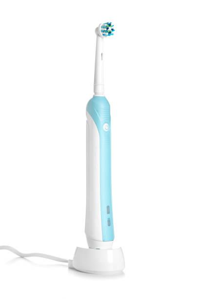 istock Electronic toothbrush on charge isolated on white background 1162335236