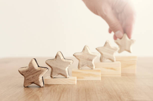 istock business concept image of setting a five star goal. increase rating or ranking, evaluation and classification idea 1162336417