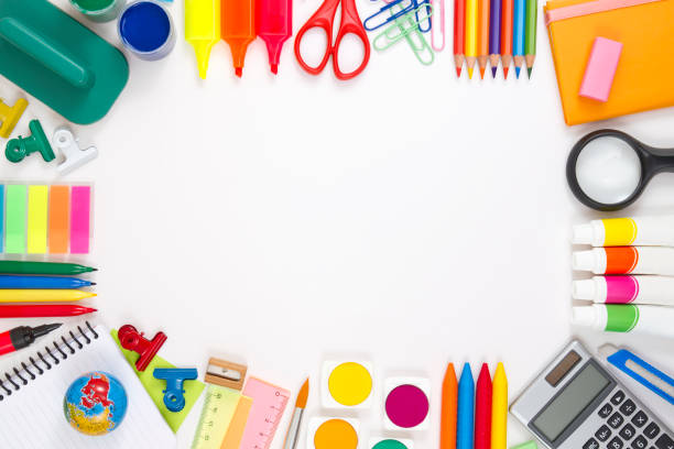 istock School Supplies Border Against White Background 1162337513