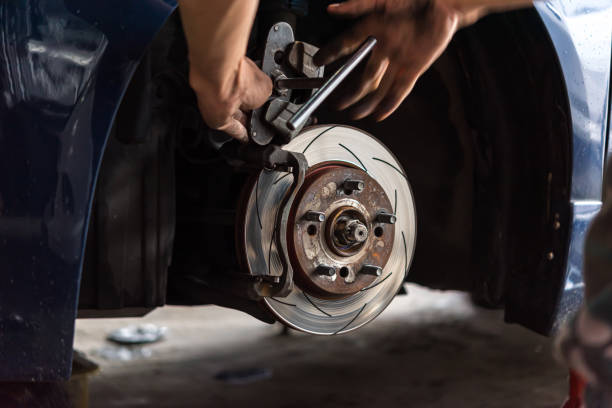 istock Disc brake and asbestos brake pads at car garage 1162341478