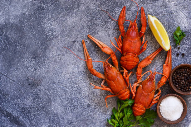 istock Crayfish boiled with spices on the kitchen table. View from above. 1162341677