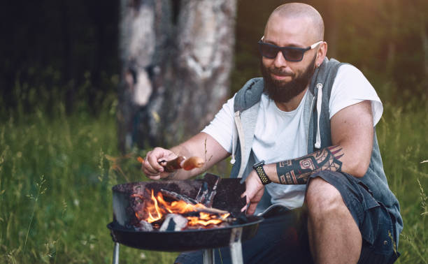 Roasting sausages on the BBQ grill