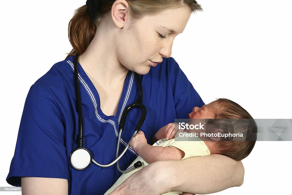 Baby Crying Female nurse consoling a crying newborn baby over white background. Midwife Stock Photo