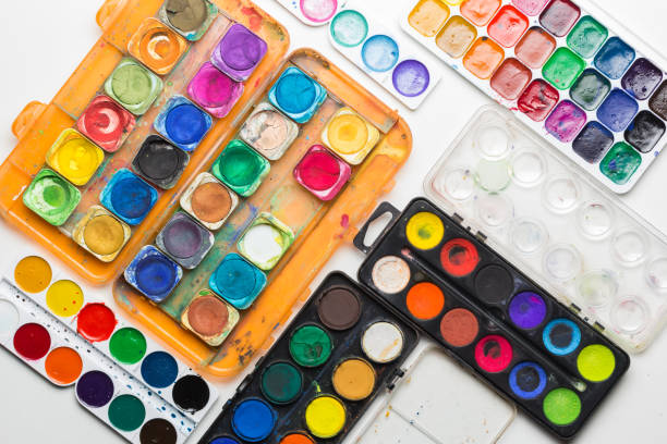 istock sets of used watercolor paints 1162349132