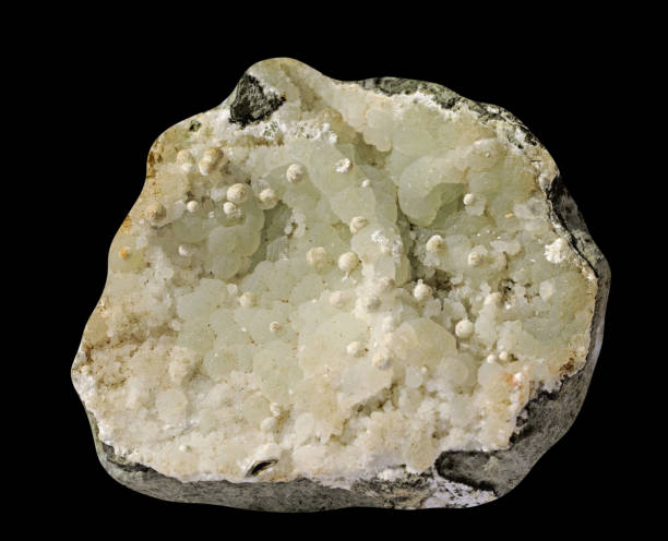 Mineral calcite with a carbonate  isolated on a black background