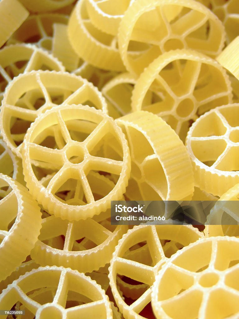 Wheels shaped pasta Close-up of raw wheel shaped pasta Close-up Stock Photo