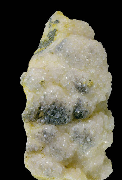 istock Great calcite crystal with pyrite isolated on black background 1162350561