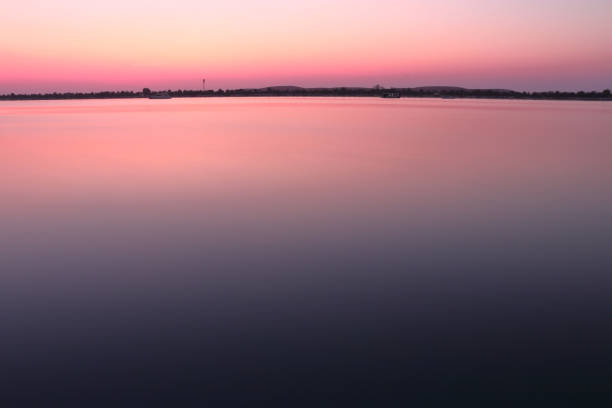 istock SUNSET VIEW FROM SEA SHORE - LONG EXPOSURE 1162351722