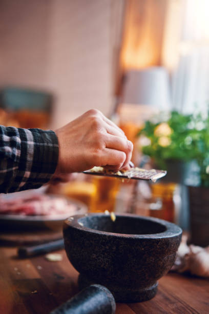 istock Preparing Oriental Spice Mix for Lamb Chops 1162354515