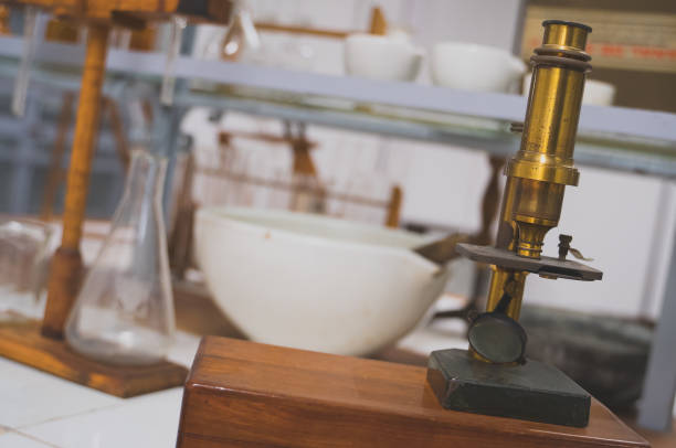 istock Retro golden microscope in the laboratory. 1162354888