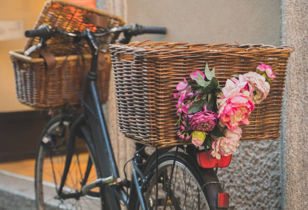 istock Retro bicycle with baskets parked near the wall. 1162355684