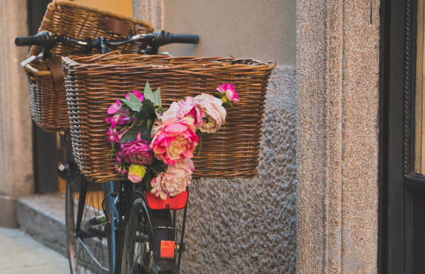 istock Retro bicycle with baskets parked near the wall. 1162355689
