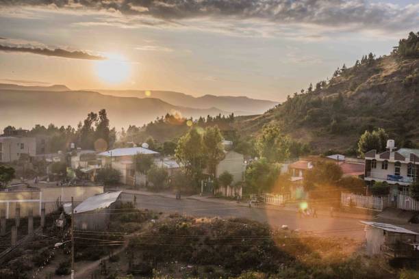 Ethiopian city. High angle view. Sunrise. Abandoned buildings, street, forest, cars, buildings. African city. Sunrise. Hills. ethiopia city stock pictures, royalty-free photos & images