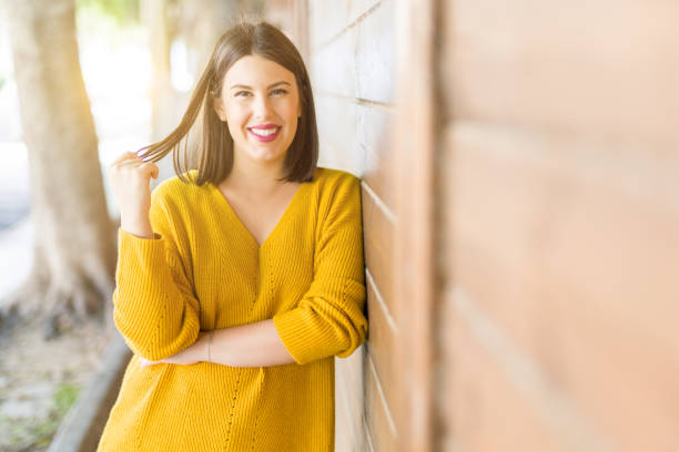 istock Beautiful young woman at the steet 1162358598