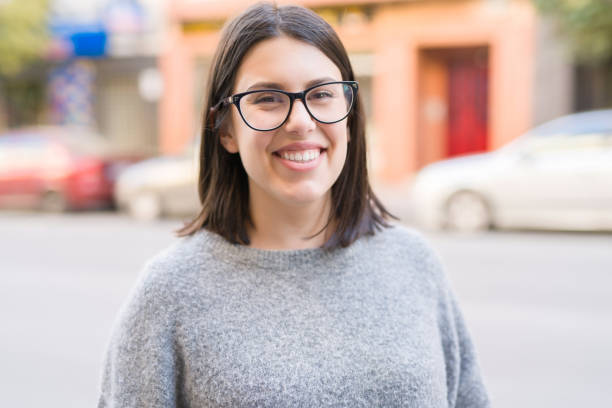 istock Young beautiful woman smiling 1162358858