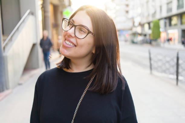 istock Young beautiful woman smiling 1162359436