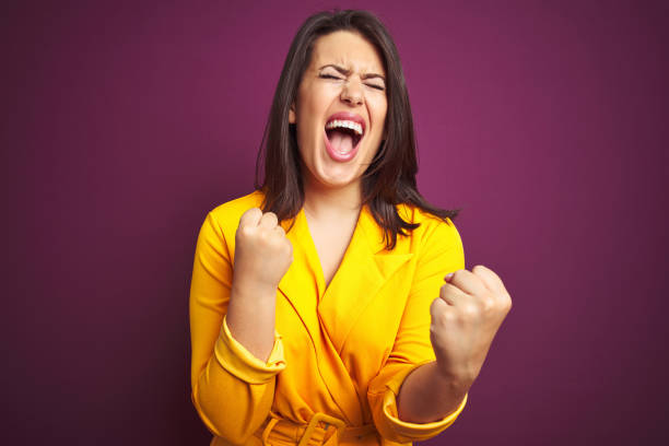 istock Young beautiful woman over colorful background 1162360114