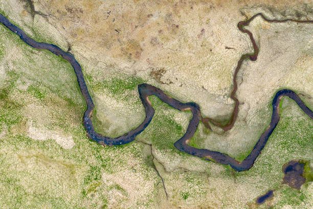 istock Aerial view of winding small river, Iceland 1162370370