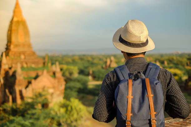 istock Rear View Of Man Visiting Old Historic Temple 1162377657