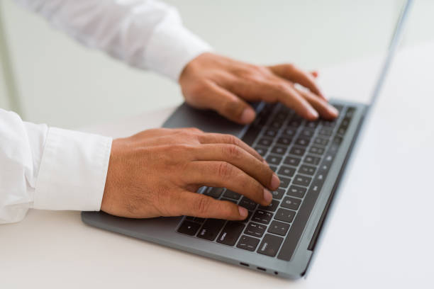 istock Close up of business man working using computer laptop 1162381063