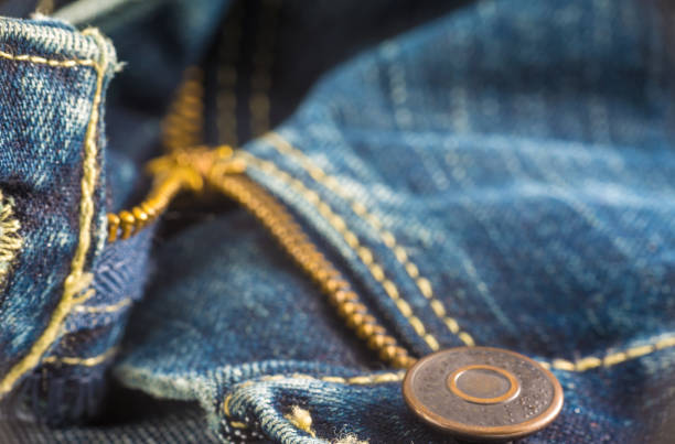 istock Closeup on blue jeans zipper and button 1162388252