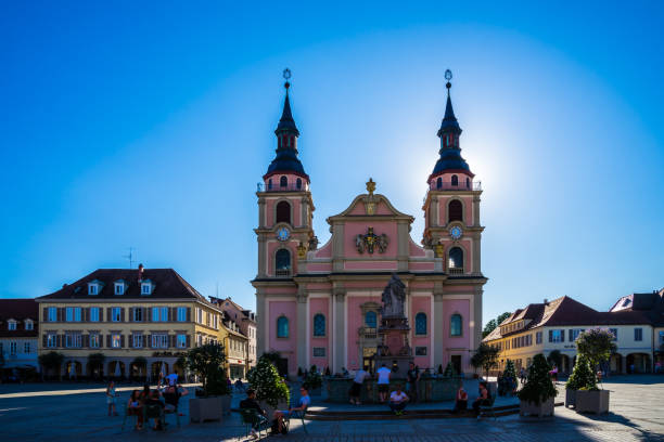 Ludwigsburg, Germany, July 4, 2019, Many people enjoying hot summer day on marketplace downtown in city Ludwigsburg in shadow of famous baroque church stadtkirche Ludwigsburg, Germany, July 4, 2019, Many people enjoying hot summer day on marketplace downtown in city Ludwigsburg in shadow of famous baroque church stadtkirche ludwigsburg photos stock pictures, royalty-free photos & images