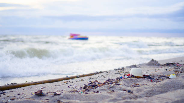 istock Garbage on the beach is any human that is disposed on the sea or abandoned on beaches. 1162389748