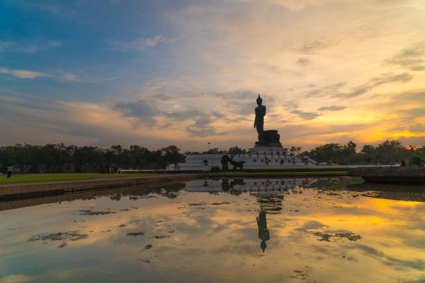 istock silhouette big buddha statue in sunset 1162390107
